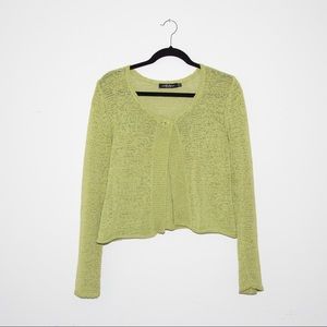 Green woman’s cardigan